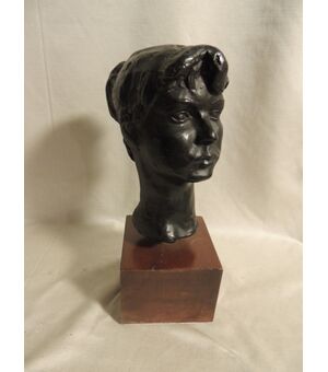 bronzo ;testa di fanciulla di  Molino  , h cm 24   