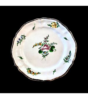 Majolica plate with &quot;half rose&quot; decoration at third fire.Ferniani manufacture, Faenza.     