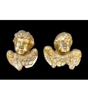 Two figures of cherubs in carved wood and gold leaf Liguria.     