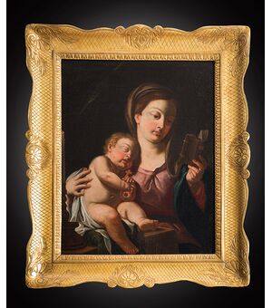 Ancient oil painting on canvas depicting Madonna with sleeping child. Naples late eighteenth century.     