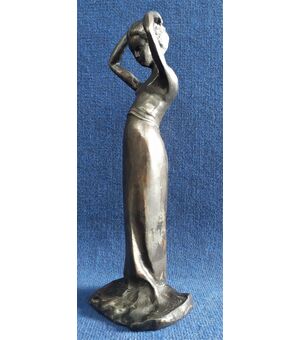 P. Troubetzkoy (1866-1938) Bronze sculpture &quot;Girl combing her hair&quot; cm 44 h     
