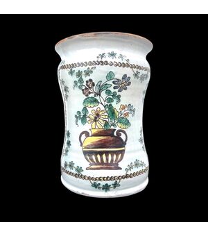 Majolica albarello decorated with vase of flowers and plant motifs. Manufacture of Cerreto Sannita. Date 1791.     