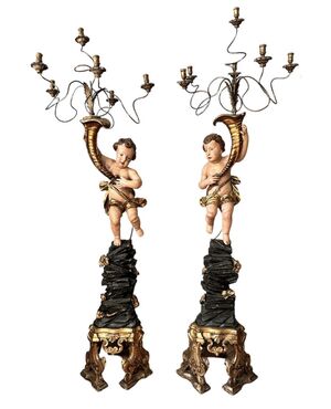 Luigi XIV Coppia di Putti laccati e dorati con Candelabri 
