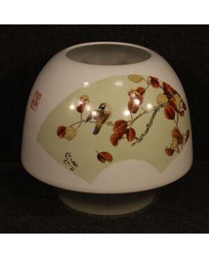 Chinese painted ceramic vase with floral decorations