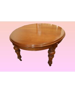 Antico grande tavolo circolare allungabile del 1800 inglese in legno di mogano presenta allunghe già restaurato