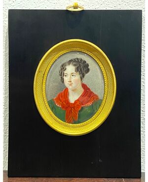 Miniatura a olio raffigurante volto femminile  con cornice lignea.