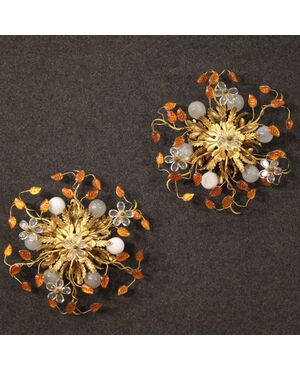 Pair of wall lights in golden metal with colored glass