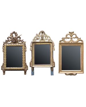 Serie di tre specchiere del XVIII secolo in legno dorato