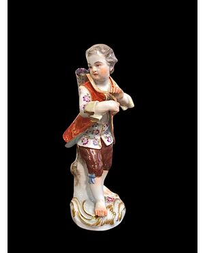 Statuina in porcellana con figura maschile con cesto.Meissen.