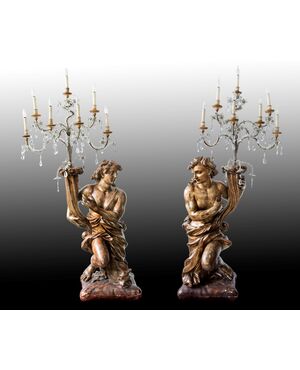 Scultore italiano del XVII secolo, coppia di candelieri legno scolpito e dorato