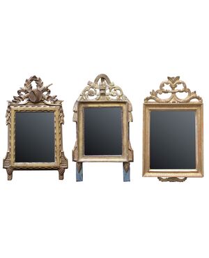 Set of three 18th century mirrors in gilded wood     