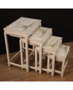 Four French coffee tables in lacquered and painted wood