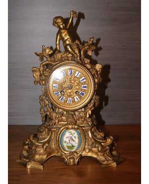 Orologio in bronzo del 1800 con medaglione in porcellana di sevres