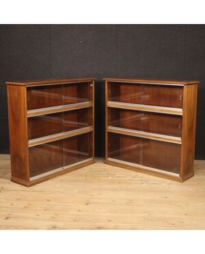 Pair of Italian bookcases in walnut wood with glass doors