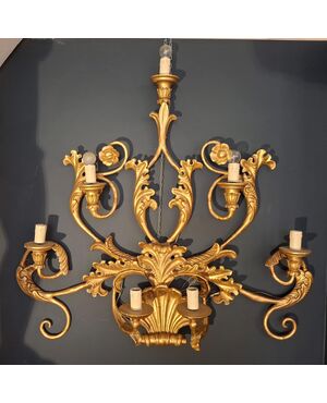 Grande applique in legno dorato