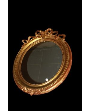 Specchiera ovale Francese in legno dorato foglia oro del 1800