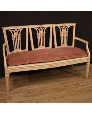 Sofa in lacquered and painted wood in Louis XVI style