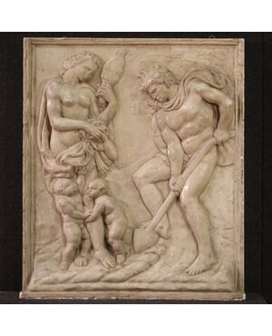 Bas-relief sculpture in plaster, Adam and Eve at work