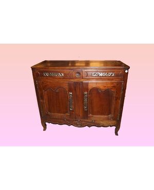 Credenza provenzale a due porte del 1800 in legno di ciliegio con intagli 