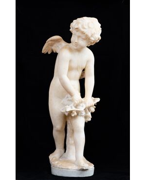 Scultura antica in alabastro raffigurante Cupido. Francia XIX secolo.