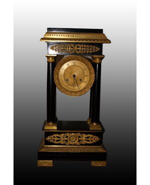 Orologio francese stile Impero del 1800 in legno ebanizzato con bronzi