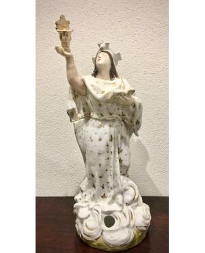 Veilleuse tea pot in porcelain. On figure of Santa holding book and holy water font.Model Jacob Petit.France.     