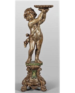 Scultura lignea argentata raffigurante un putto.