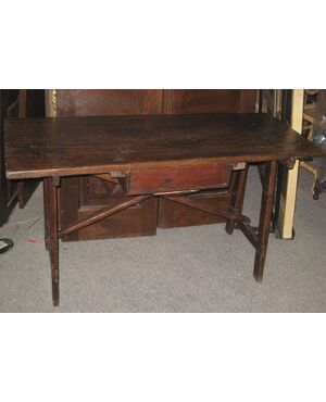 Trestle table in chestnut with drawer