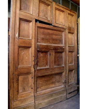 ptn199 door with central door, walnut raw mis.h 314 x 253 cm width.