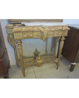 golden console with planter