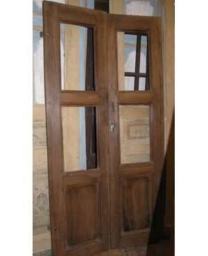 pti560 a door to two walnut doors, mis. cm 200 x 100 x 3.3