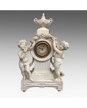Clock in porcelain biscuit (France 1880)     