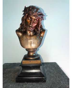 Bronze bust of Christ on a blackboard stone base.Italy     