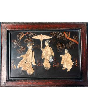 Lacquered panel with wooden frame with ivory and mother of pearl characters. Japan     