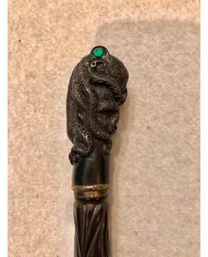 Ebony stick with knob depicting an octopus. Carved in ebony carved.     