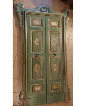 Beautiful two-leaved door with camouflaged frame     
