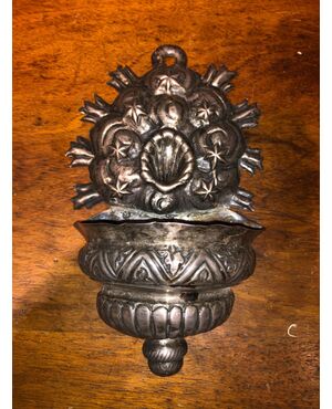 Holy water stoup in embossed silver.North Italy.     