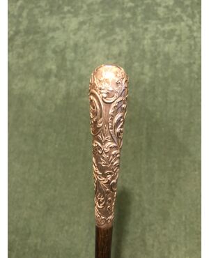 Stick with silver handle with floral and rocaille decoration.     