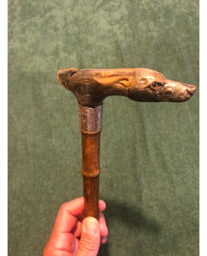 Stick with horn handle with whistle and dog&#39;s head. Engraved date.     