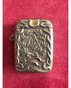 Brass matchbox with Masonic symbols.     
