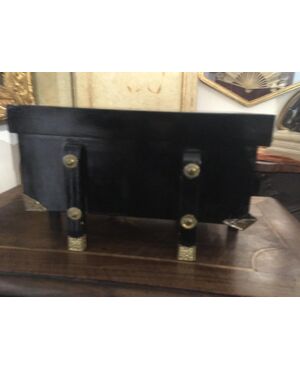 Black lacquered box with golden elements     