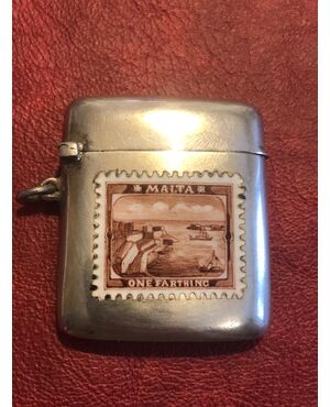 Silver matchbox with enamel stamp decoration. Italy.     