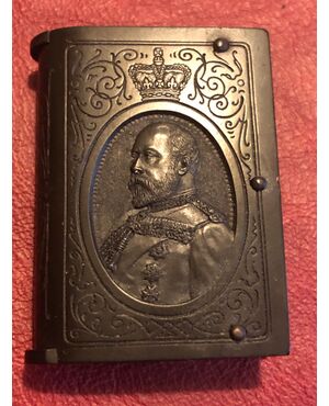 Book-shaped bakelite matchbox with a profile of King Edward VII and inscription of the order of the garter.England.     