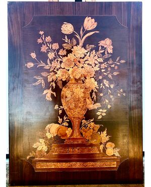 Inlaid wood panel with vase and flower decoration.     