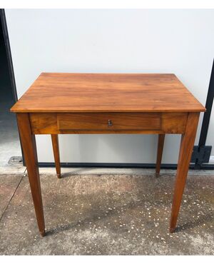 Blond walnut coffee table with one drawer, Directory period.     