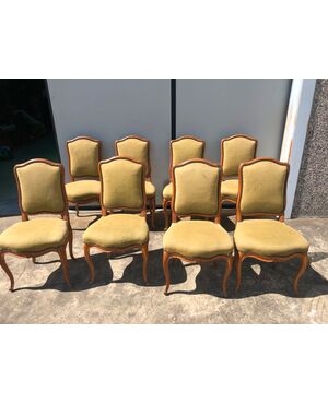 Eight Louis Philippe period cherry chairs.     
