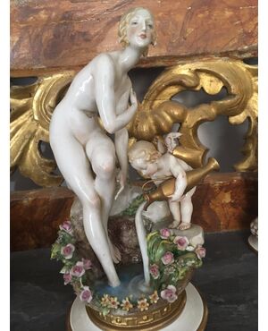 Woman with cupid Capodimonte     