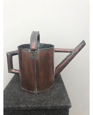 Pouring-copper watering can.     