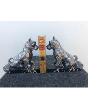 Pair of marble and antimony bookends depicting two dogs.     