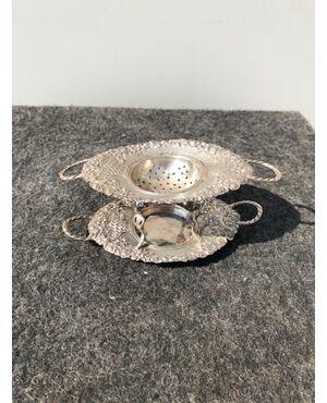 Double colander in silver with two handles with floral decorations.Italy.     